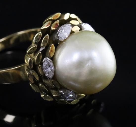 An 18ct gold, diamond and cultured pearl dress ring by John Donald, circa 1970, in modernist setting, size P/Q.